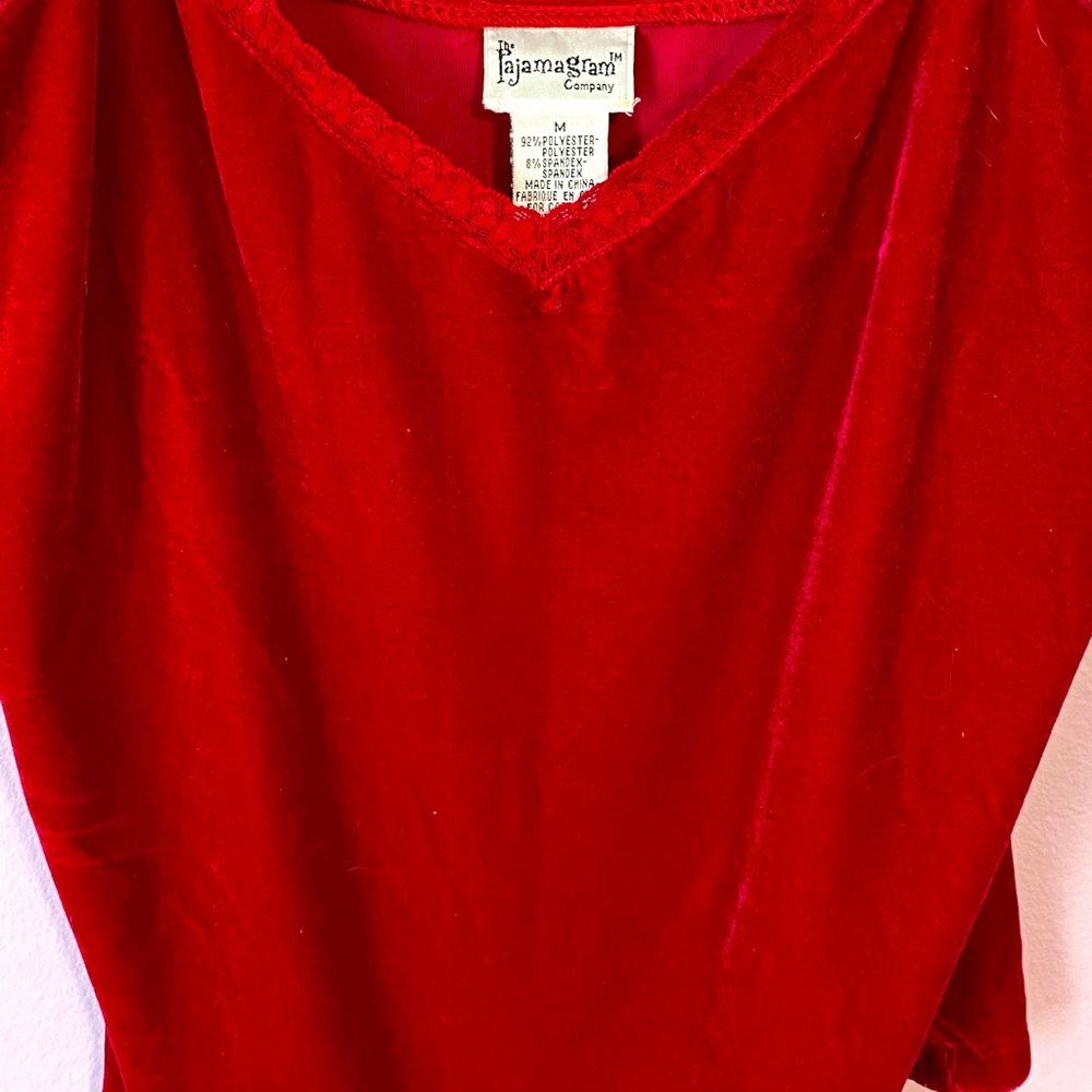 Red velvet-like Pajamagram pajamas. 92% polyester and 8% spandex